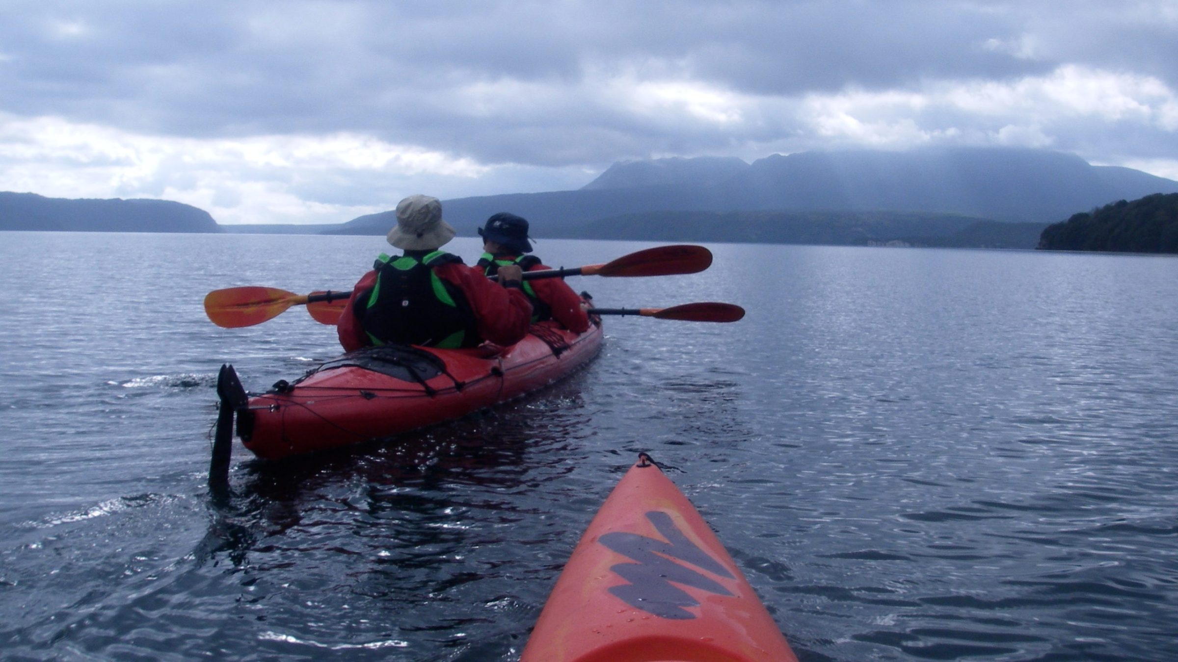a small boat in a body of water