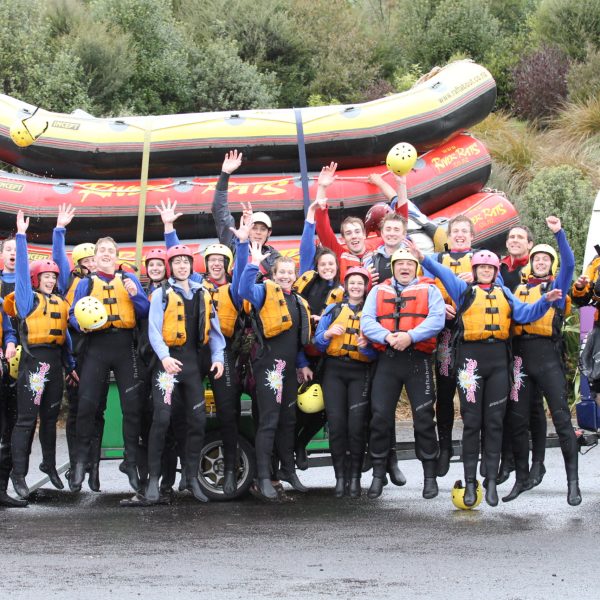 a group of people posing for the camera