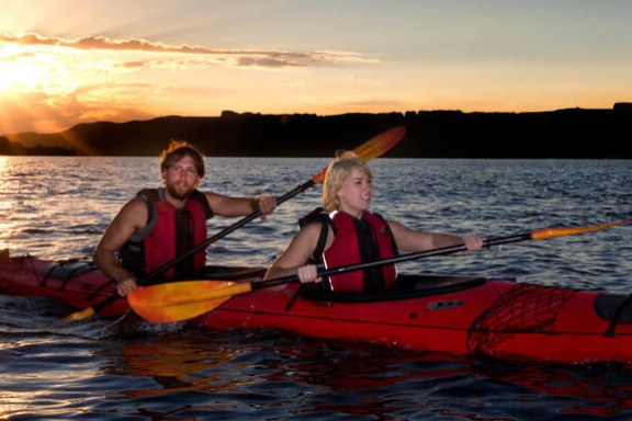 a small boat in a body of water